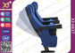 La gravedad moldeada de la espuma de la PU pliega sillas del asiento del teatro que la cubierta de tela con aparta proveedor
